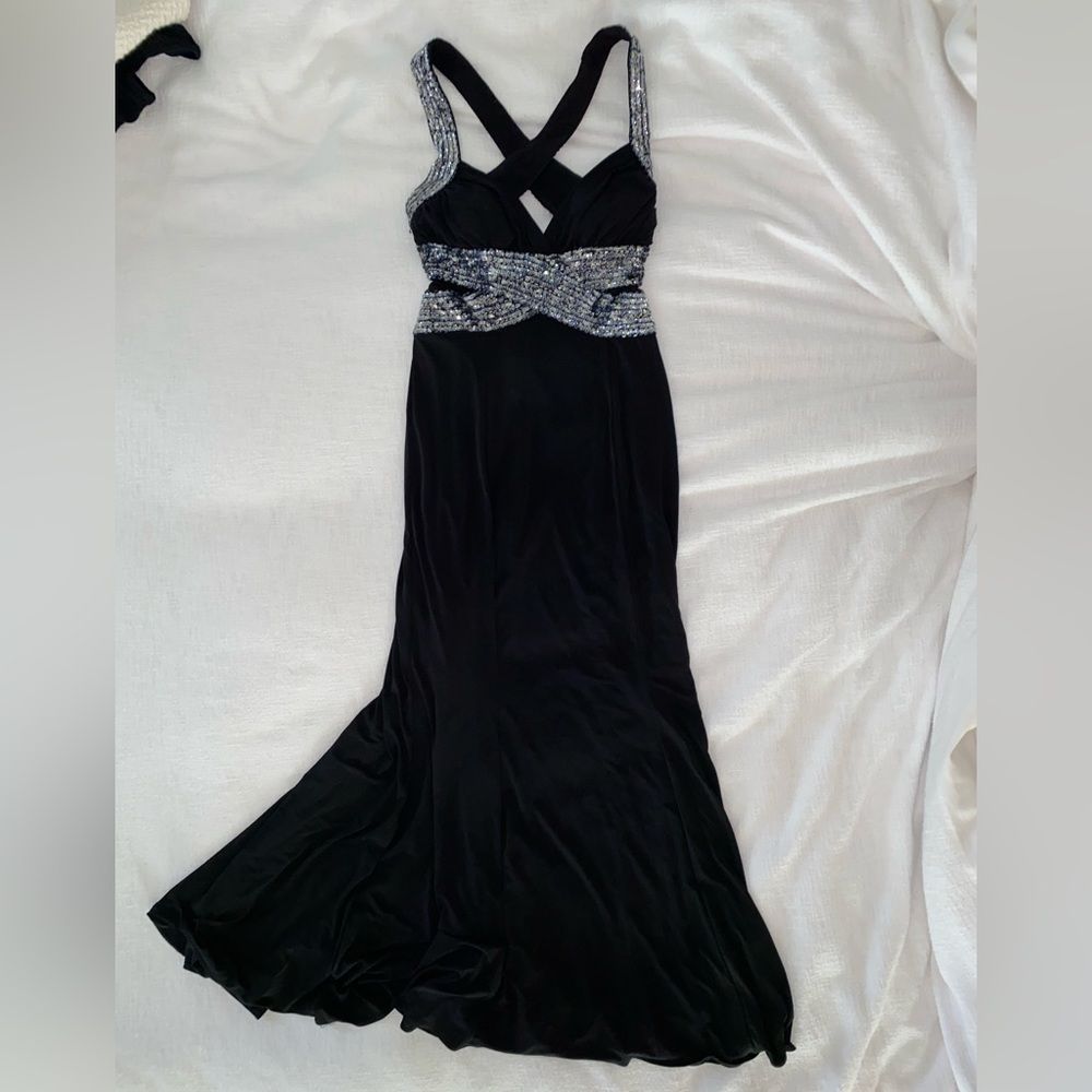 Niki Livas black sequin prom dress